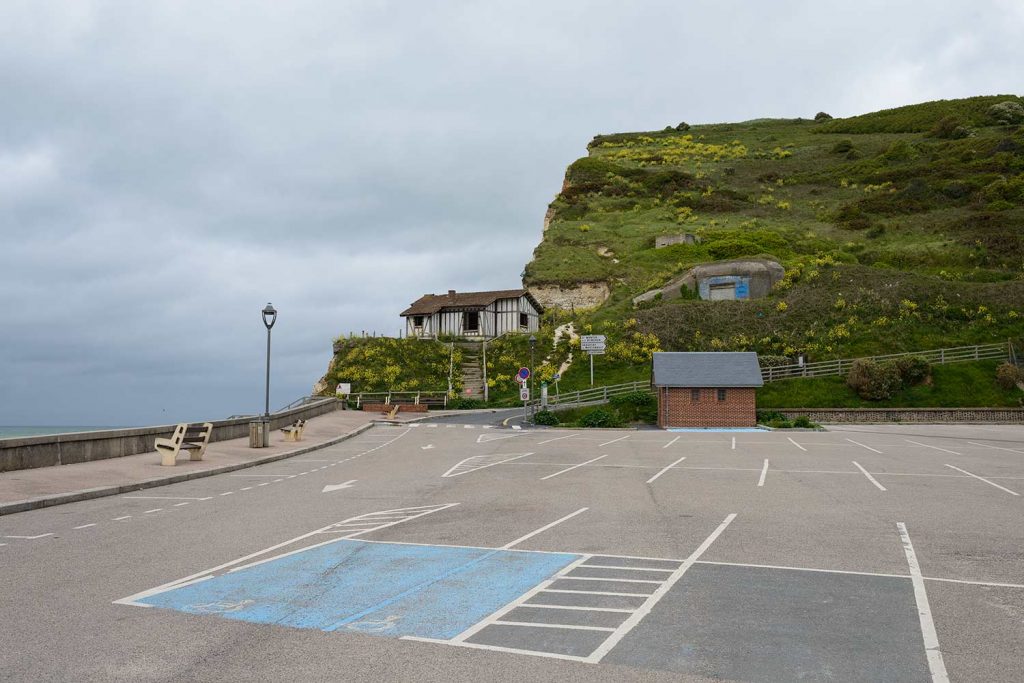 Empty car park in France with Nazi bunkers on chalk cliffs